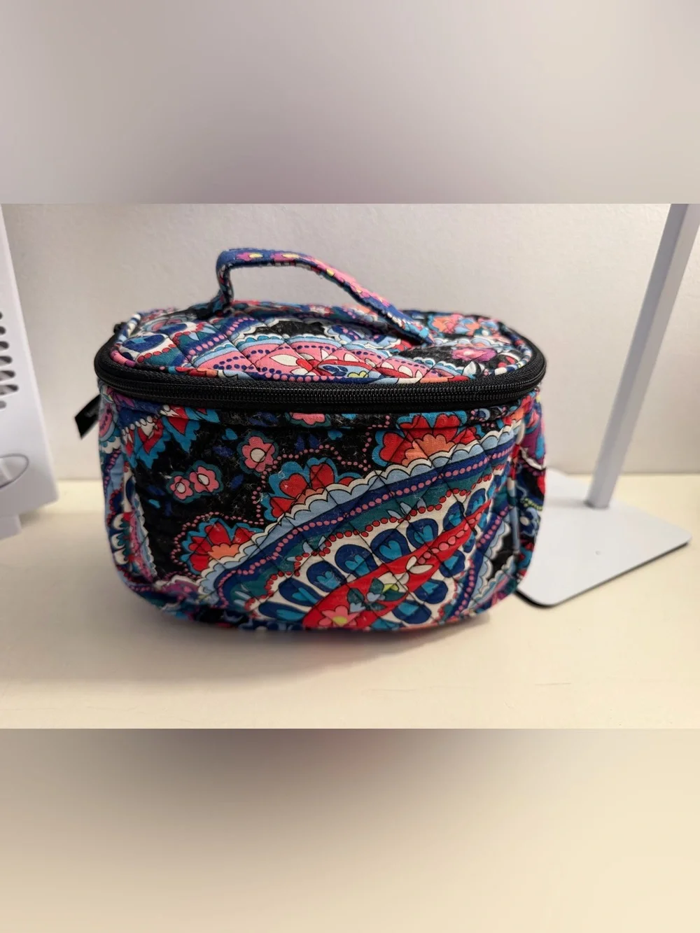 Vera Bradley Train Cosmetic Case in the Haymaker Paisley Pattern.